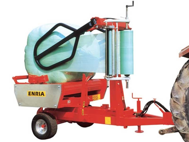 Fasciatore per rotoballe modello 120/160 con due braccia di carico a pinza